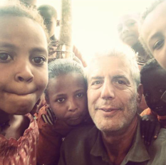 Mr. Bourdain with Local Children