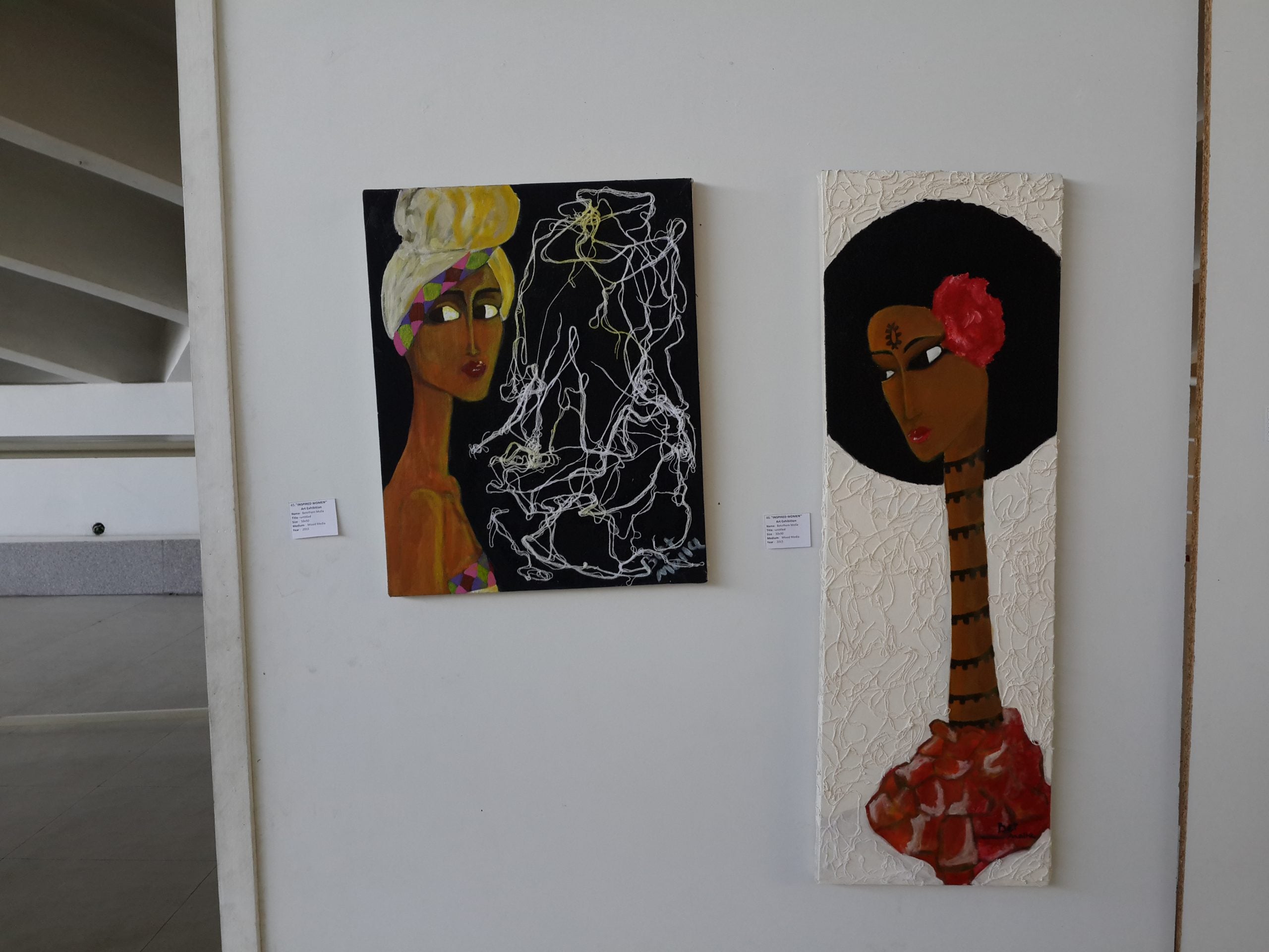 Two paintings featured in the gallery