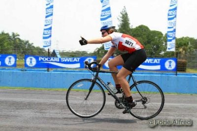 Fellow competes in a local bicycle race