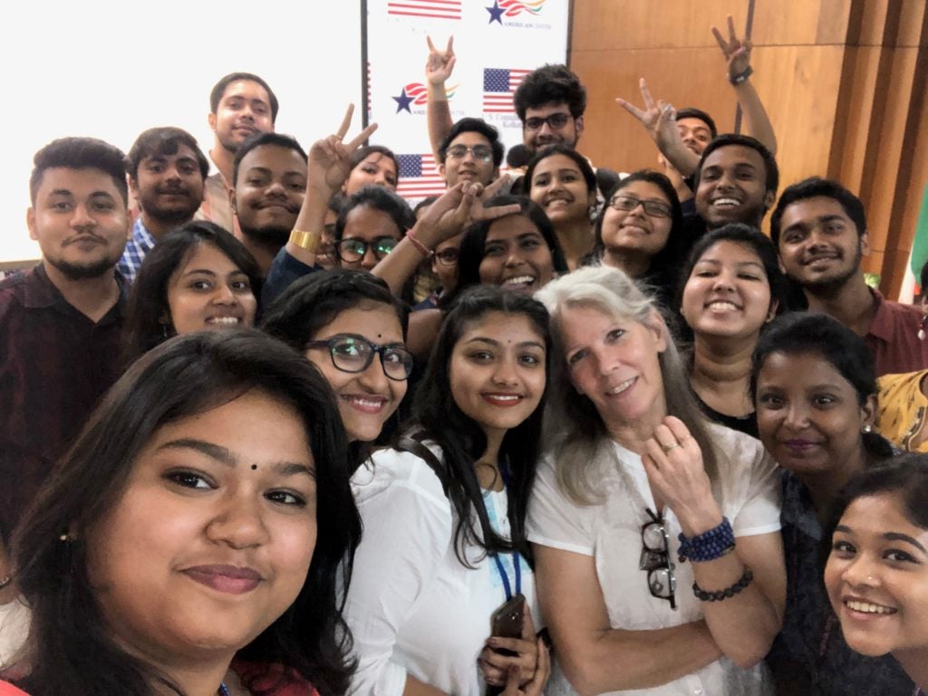 Specialist takes selfie with teacher trainees