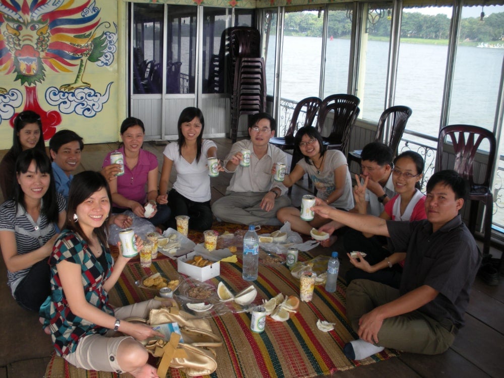 Master's degree students in Vietnam treat a Fellow to lunch on a boat tour