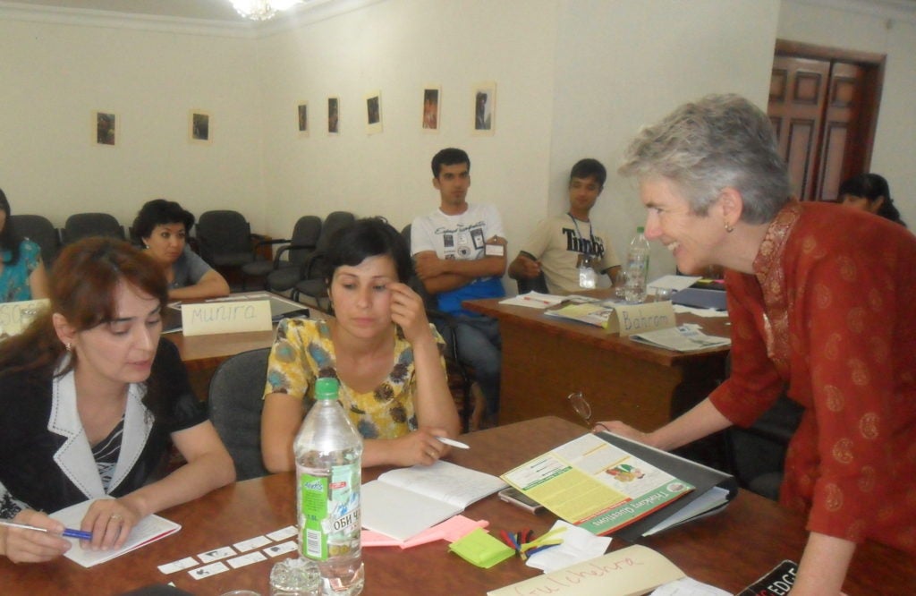 Specialist Kitty Purgason with participants in Tajikistan
